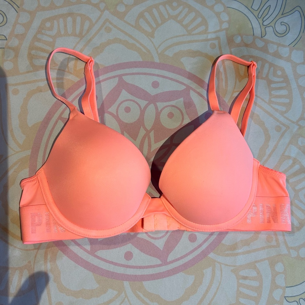Bright peach/coral Victoria’s Secret wear everywhere push-up bra 32A